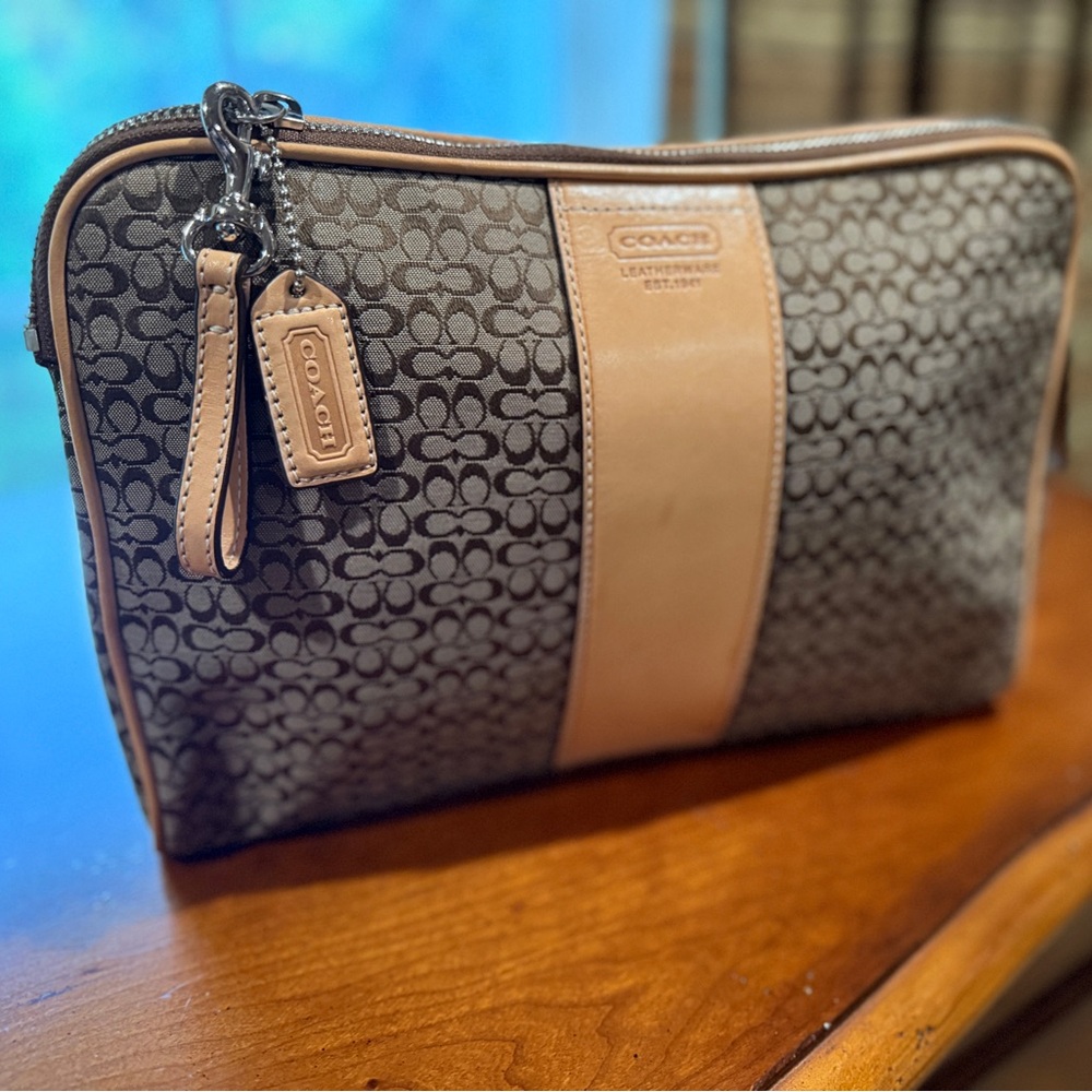Coach Woman’s Clutch Logo and Tan